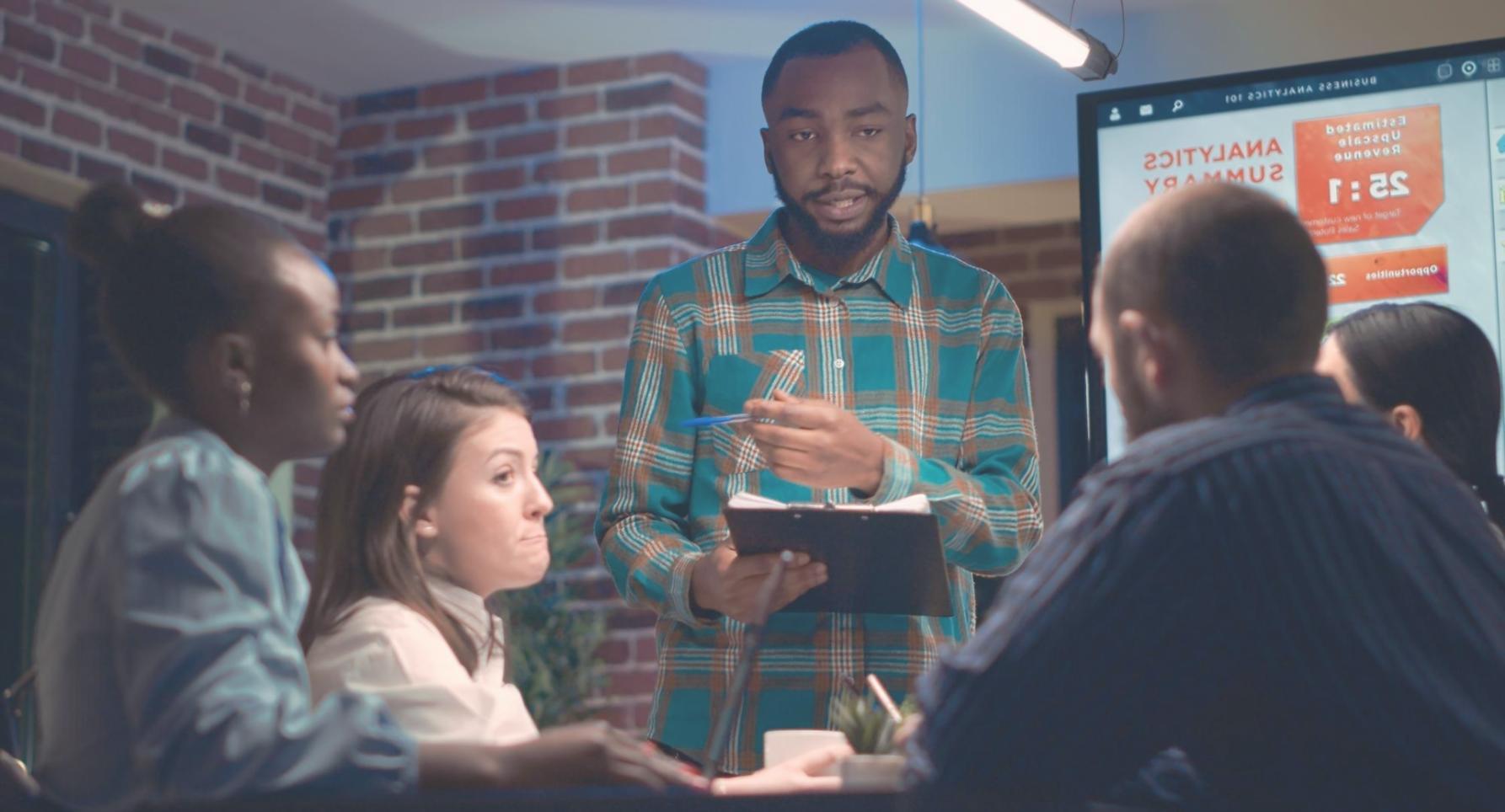 Modern office environment with financial professionals collaborating